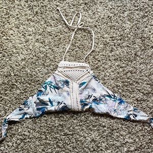 Floral bikini top with design in the middle